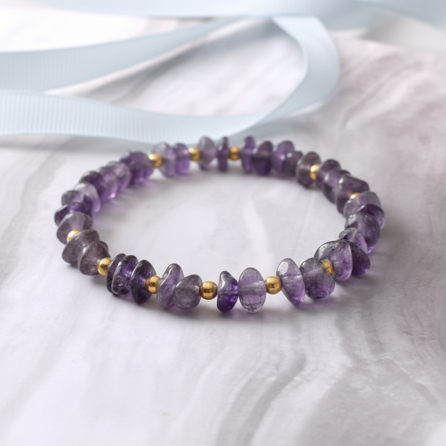 Amethyst and gold bead bracelet with purple gemstones, elegant February birthstone jewellery gift for her.