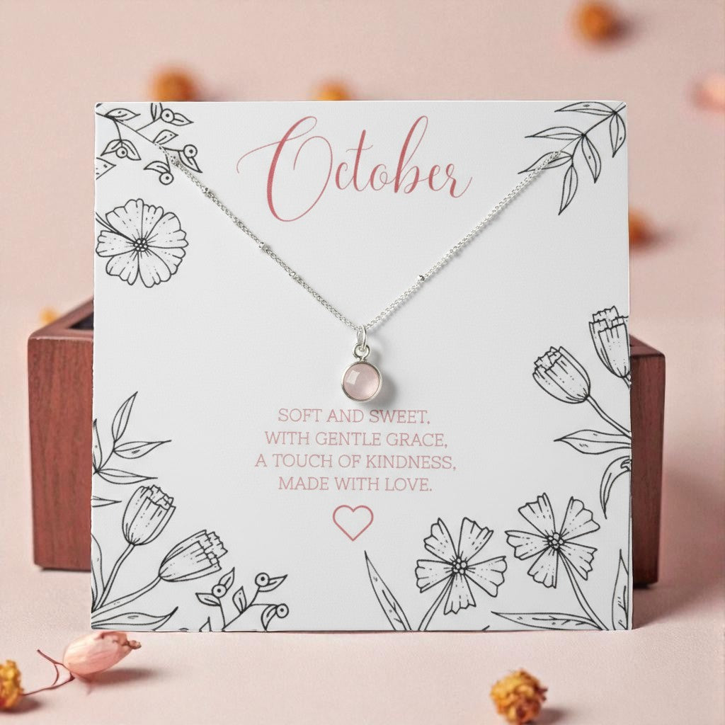Rose Quartz Birthstone Necklace presented on October birthstone message card with floral design and autumn leaves