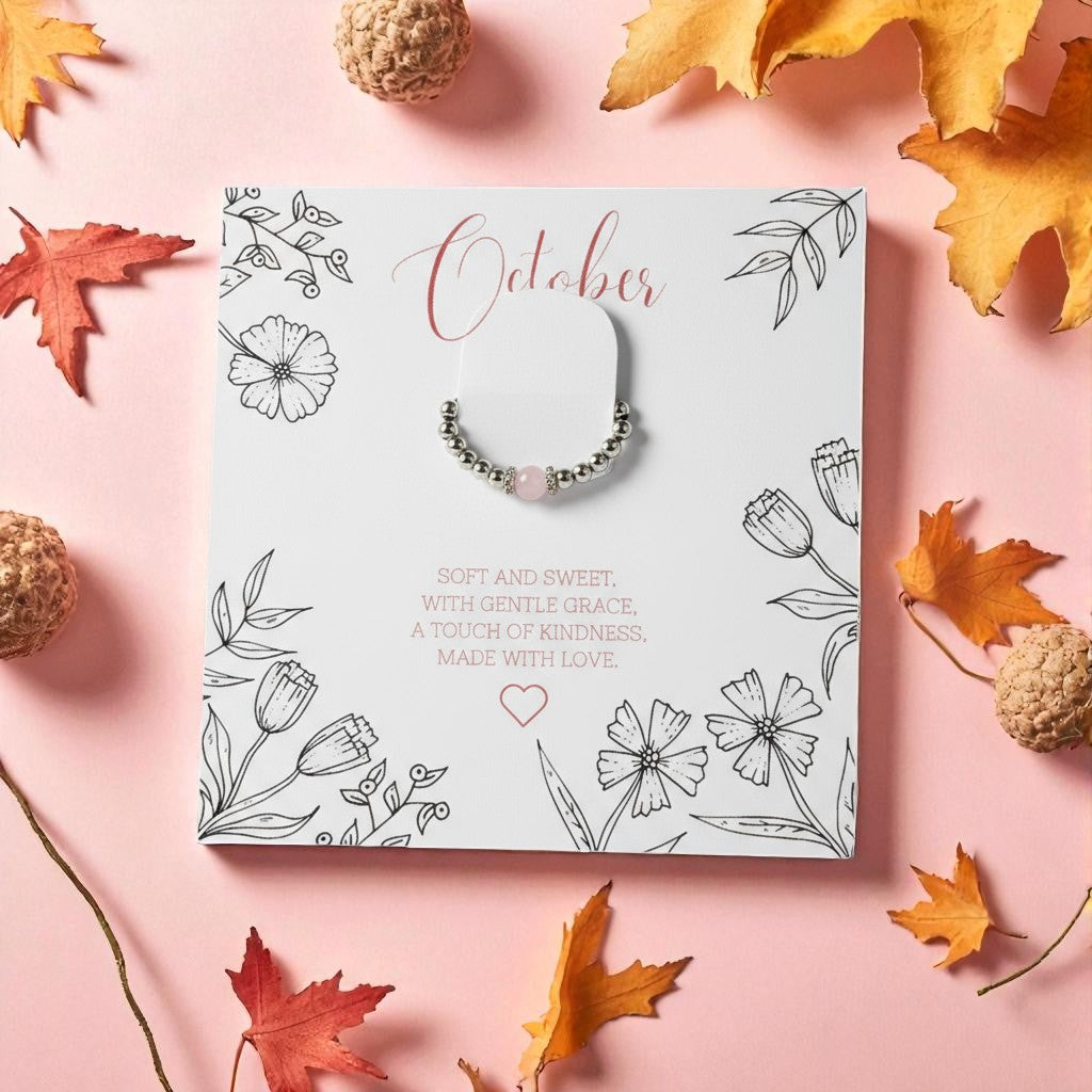 Rose Quartz Gemstone Ring presented on illustrated October birthstone message card with autumn leaves