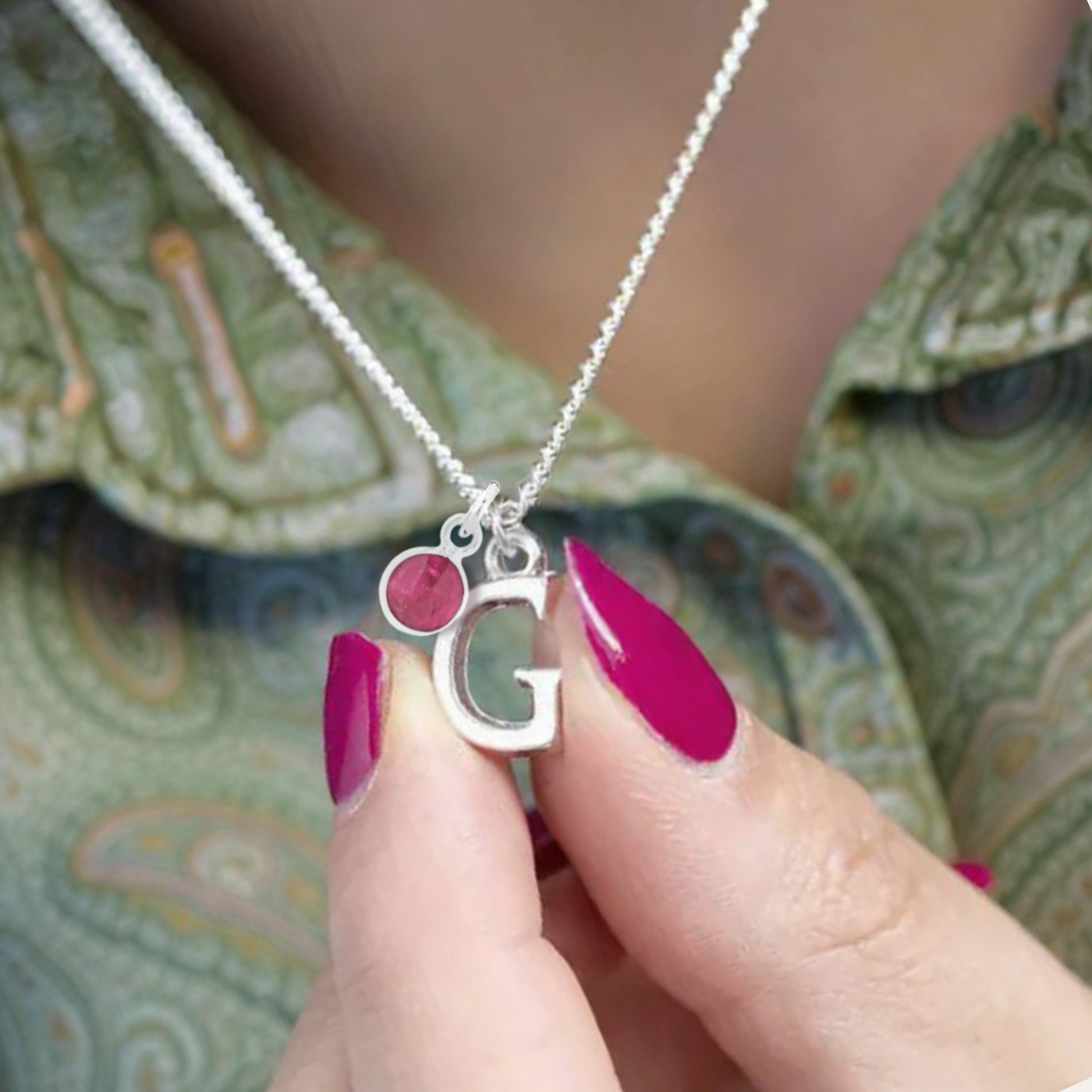 Letter and Birthstone Necklace for july birthday gifts, a sterling silver initial necklace and birthstone charm make wonderful personalised jewellery gifts for your loved ones.