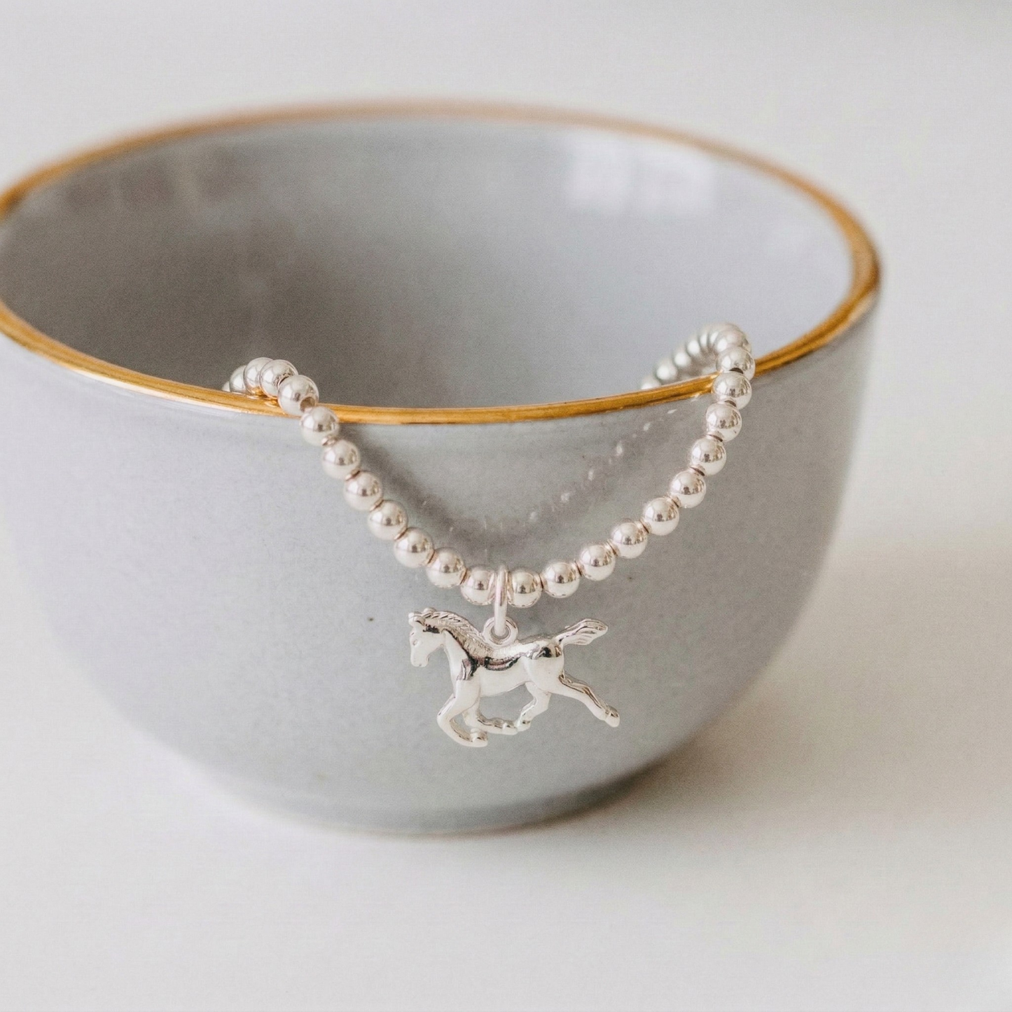 Silver horse charm bracelet in sterling silver, equestrian jewellery gift UK