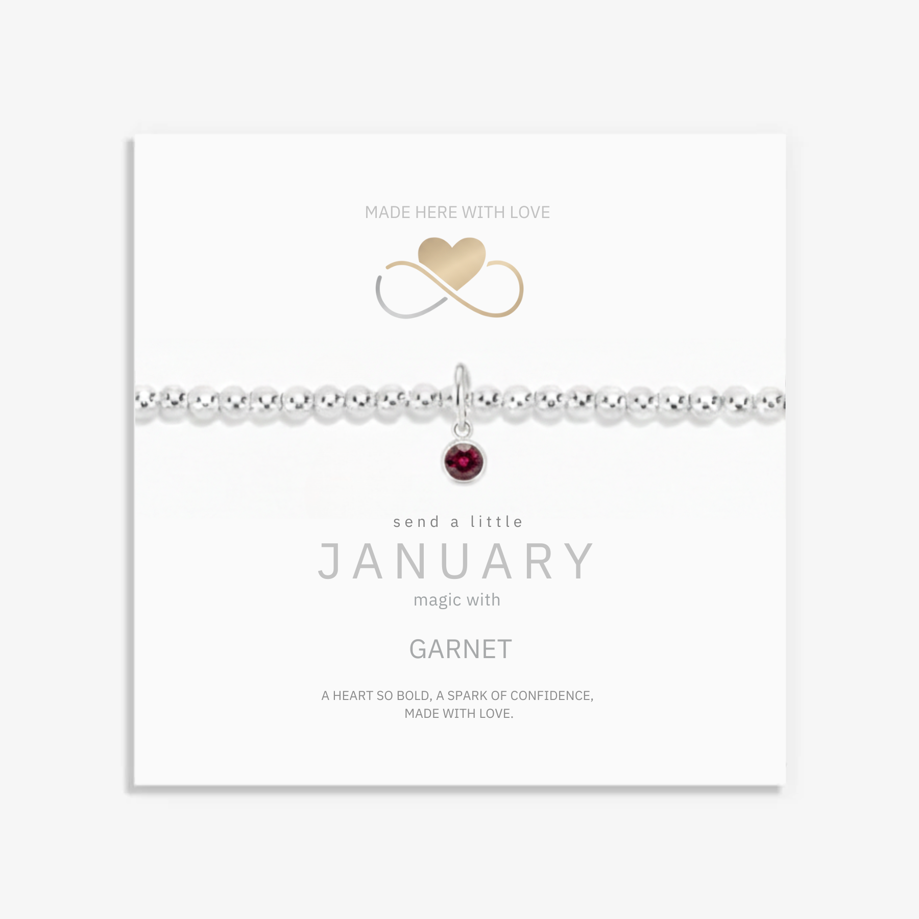 January birthstone bracelet - deep red garnet charm on sterling silver stretch bead bracelet