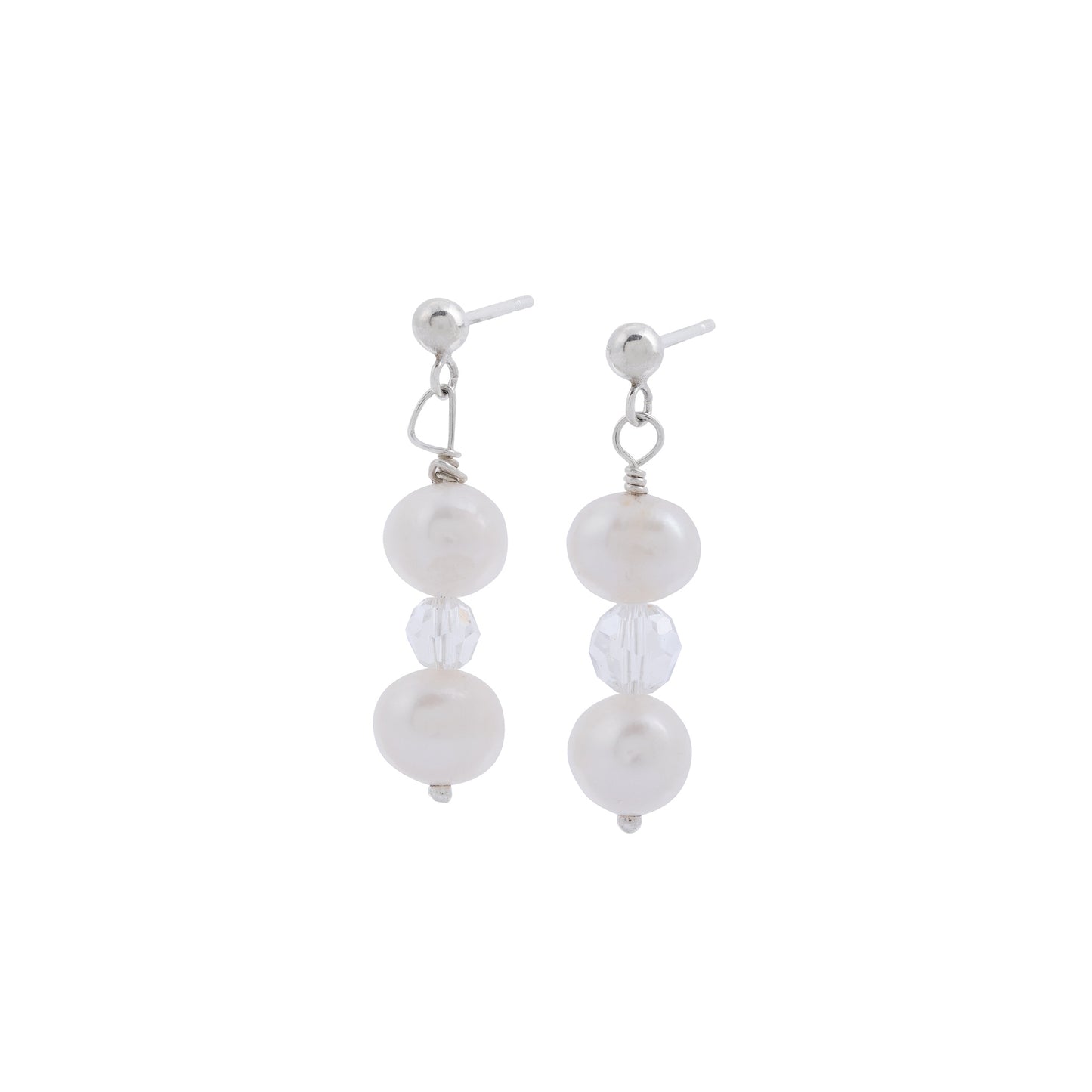 A pair of Pearl and Crystal Drop Earrings by Made Here with Love are shown against a plain white background. Each earring features two freshwater pearls with a clear, faceted bead in between. They are suspended from silver posts with small spherical ends.