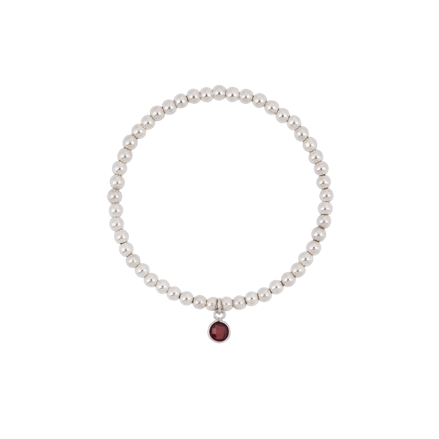 Photo of a Made Here with Love Garnet Birthstone Bracelet, composed of small, round, sterling silver beads. The bracelet features a single dangling January birthstone gemstone charm with a round, deep red gem set in a silver frame. The white background highlights the jewelry perfectly.