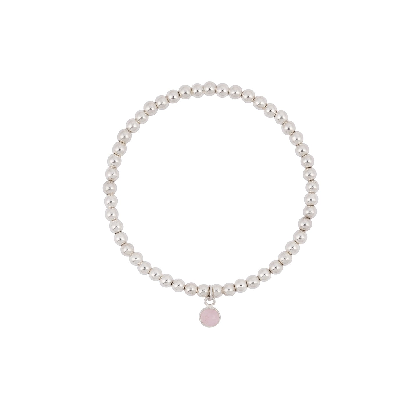 A silver beaded stretch bracelet with a small, round pink rose quartz charm hanging from it. The handcrafted sterling silver "Rose Quartz Charm Bracelet" by Made Here with Love is made of uniformly sized, shiny beads strung together in a circular shape. The pink charm adds a subtle touch of color, making it a perfect gift for loved ones.
