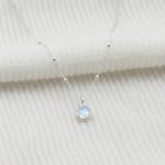 Moonstone charm necklace in sterling silver, June birthstone jewellery UK
