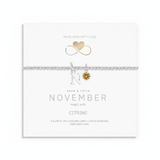 November birthstone bracelet with citrine gemstone displayed on gift card, meaningful birthday jewellery ready to gift.
