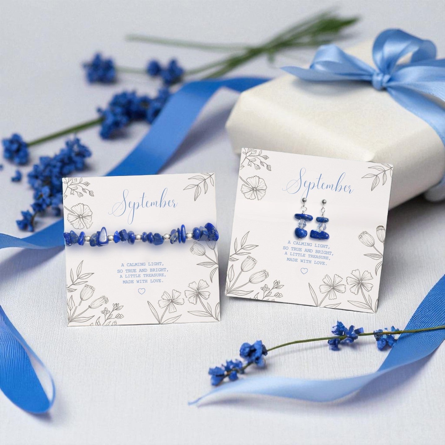 a jewellery se, bracelet and earrings, perfect for september birthday gifting, with a thoughtful meaning card this jewellery set in dark blue gemstone colours is a thoughtful gift for mother's day, september birthdays or bridesmaids wearing dark blue