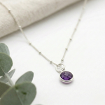 Amethyst charm necklace in sterling silver, February birthstone jewellery UK
