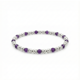 Amethyst and sterling silver bead bracelet with faceted purple gemstones on a stretch design.