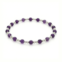 Amethyst bead bracelet with faceted purple gemstones on a stretch bracelet design.