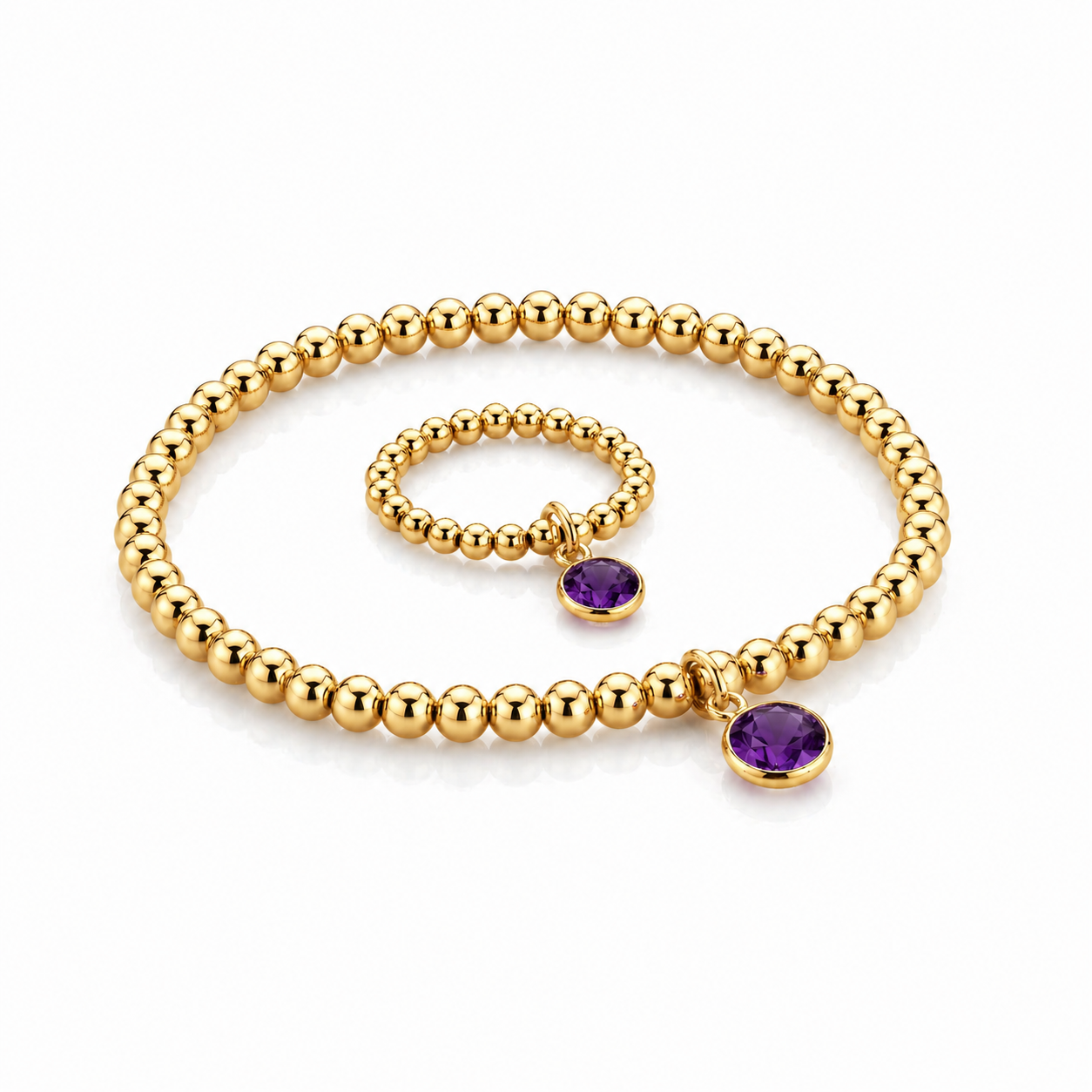 Handmade amethyst birthstone jewellery set featuring matching gold filled stretch bead bracelet and ring with oval amethyst charm, February birthstone gift by Made Here with Love