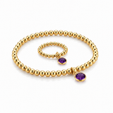 Handmade amethyst birthstone jewellery set featuring matching gold filled stretch bead bracelet and ring with oval amethyst charm, February birthstone gift by Made Here with Love