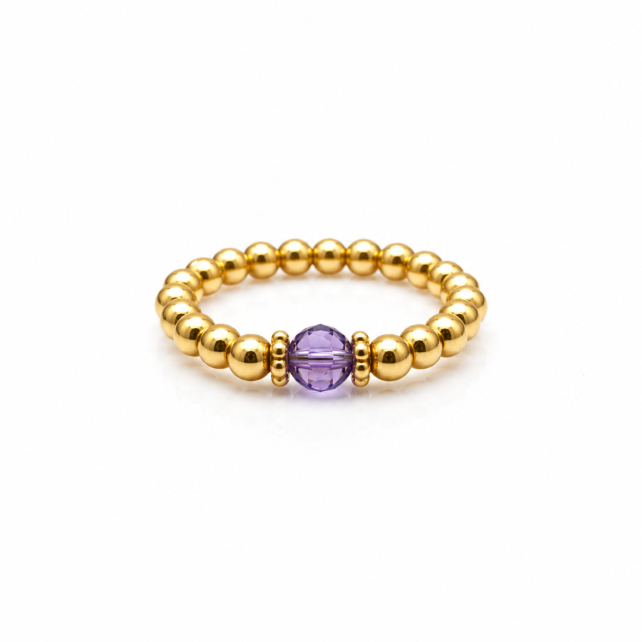 February birthstone Amethyst crystal ring with a faceted purple gemstone set on a gold filled bead ring.
