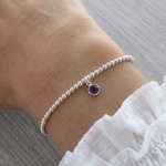 Amethyst charm bracelet in sterling silver, February birthstone stretch bracelet UK