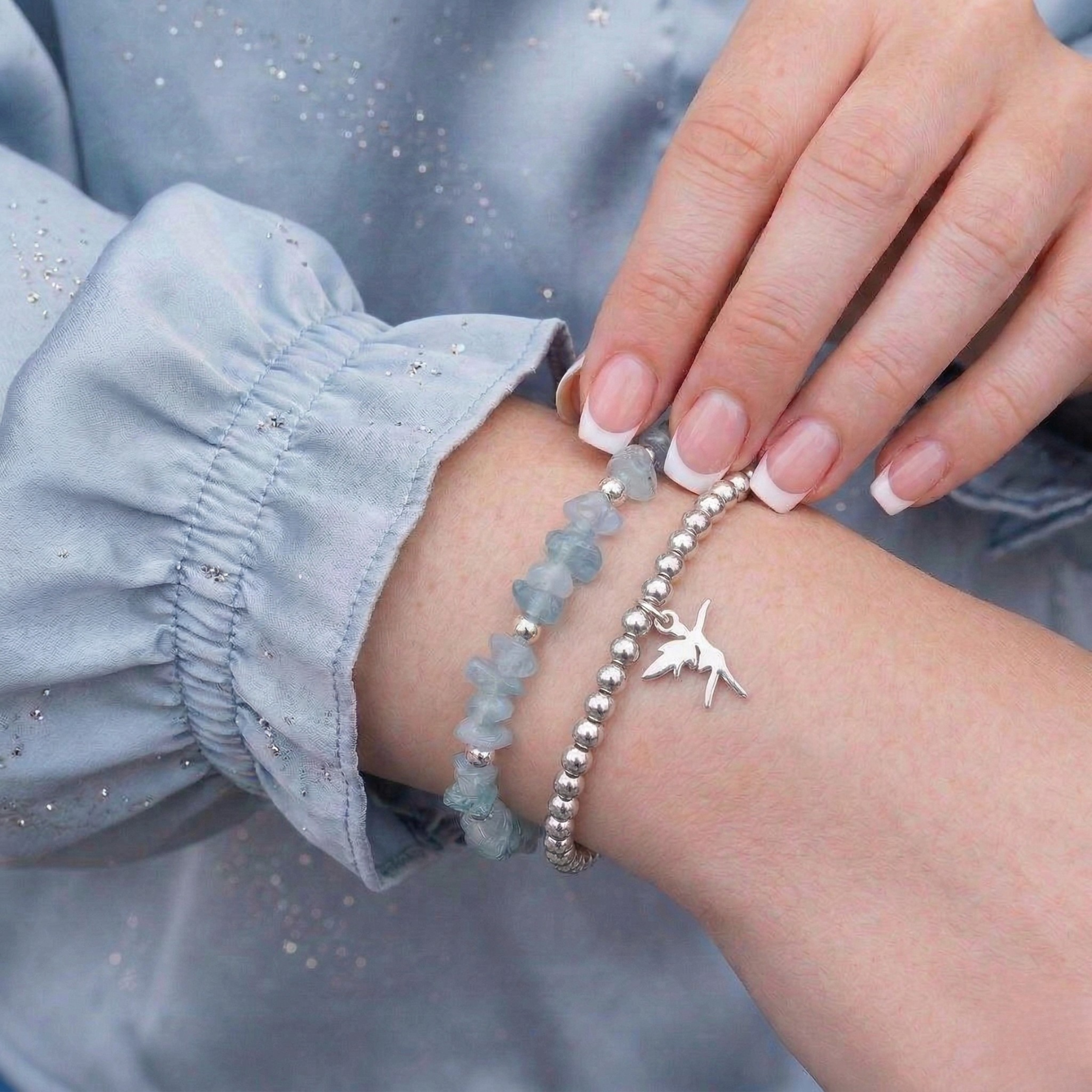 Aquamarine crystal bead bracelet with fairy charm, stretch gemstone jewellery UK