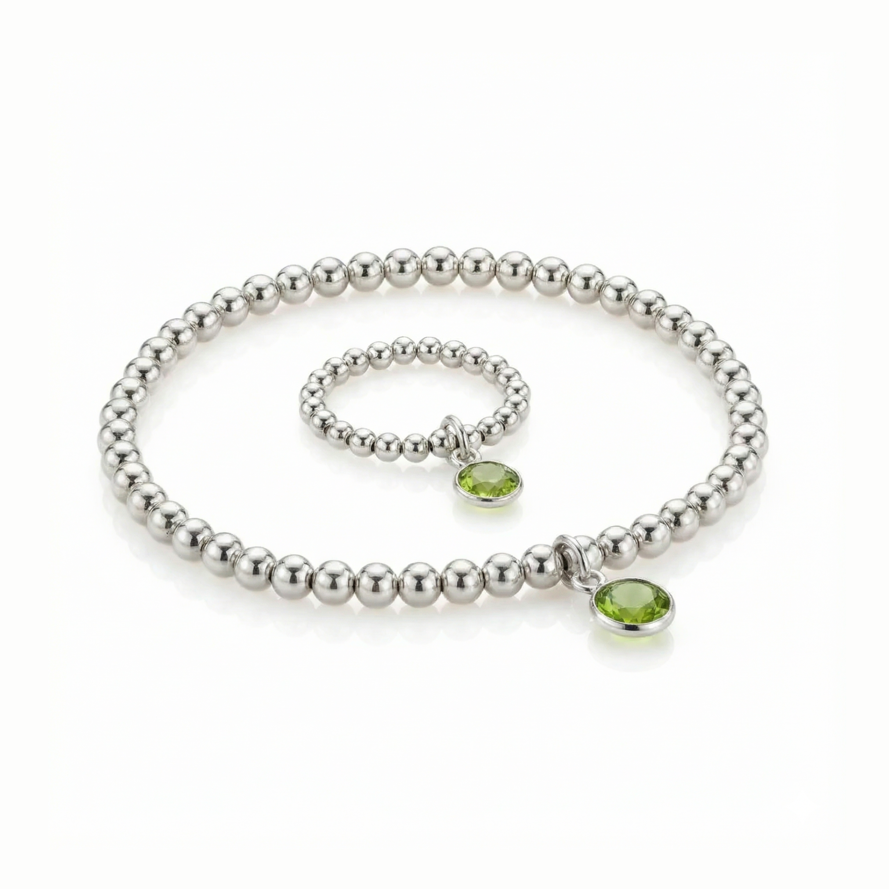 August birthstone jewellery set featuring a peridot bead ring and matching sterling silver bracelet.