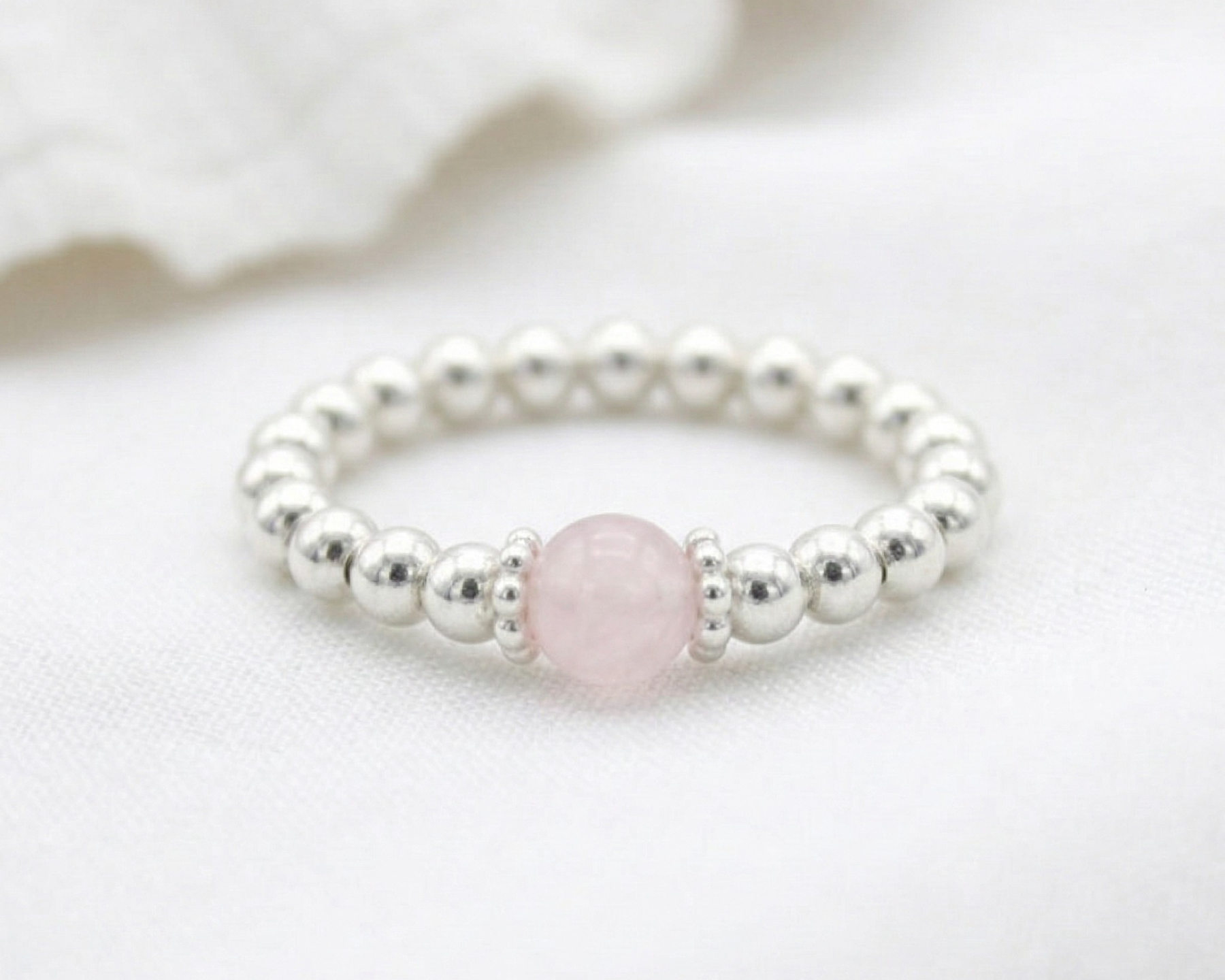 Rose quartz bead ring in sterling silver, stretchy gemstone stacking ring UK