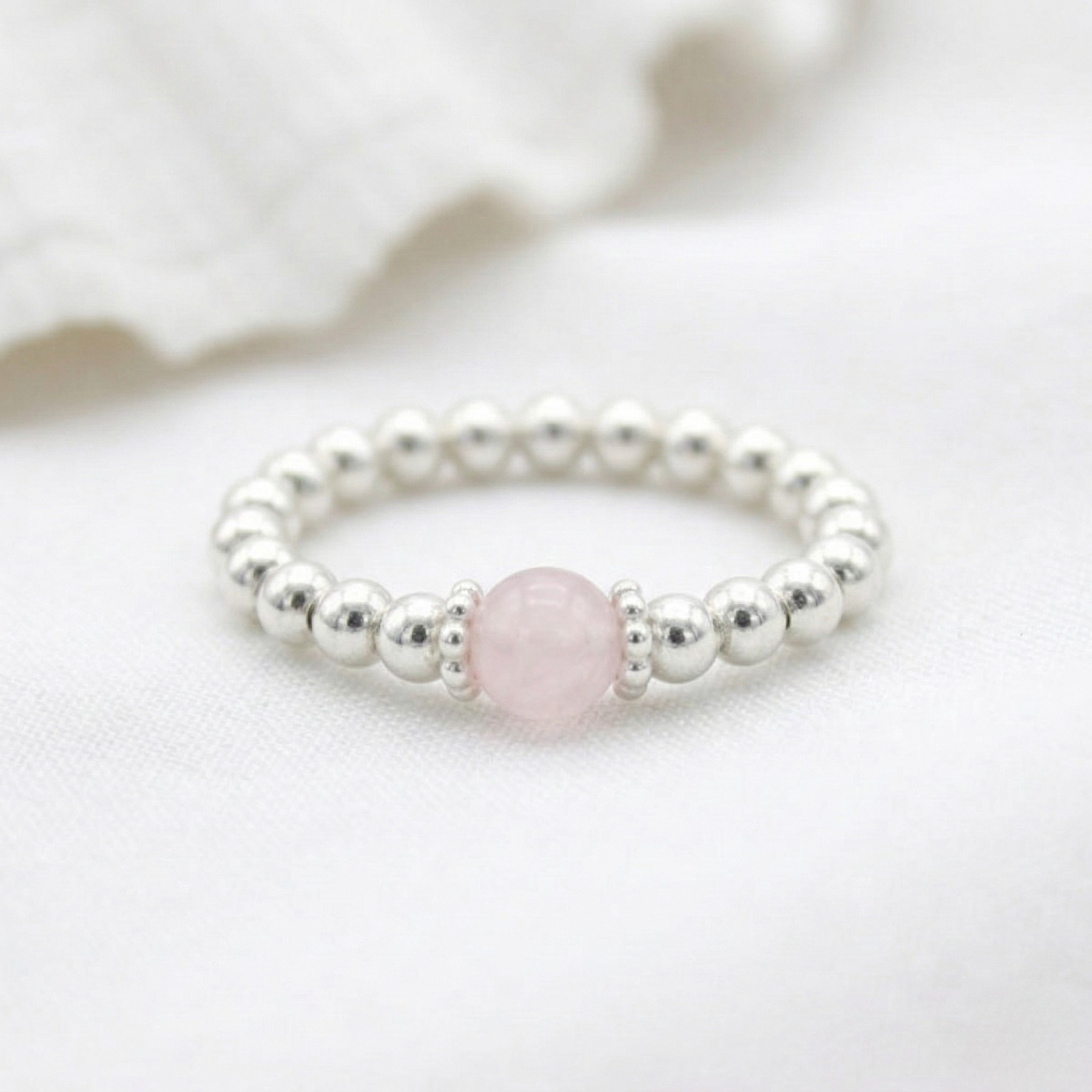 Rose quartz bead ring in sterling silver, stretchy gemstone stacking ring UK