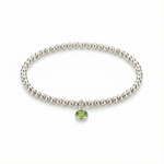 August birthstone beaded bracelet in sterling silver with peridot gemstone detail.