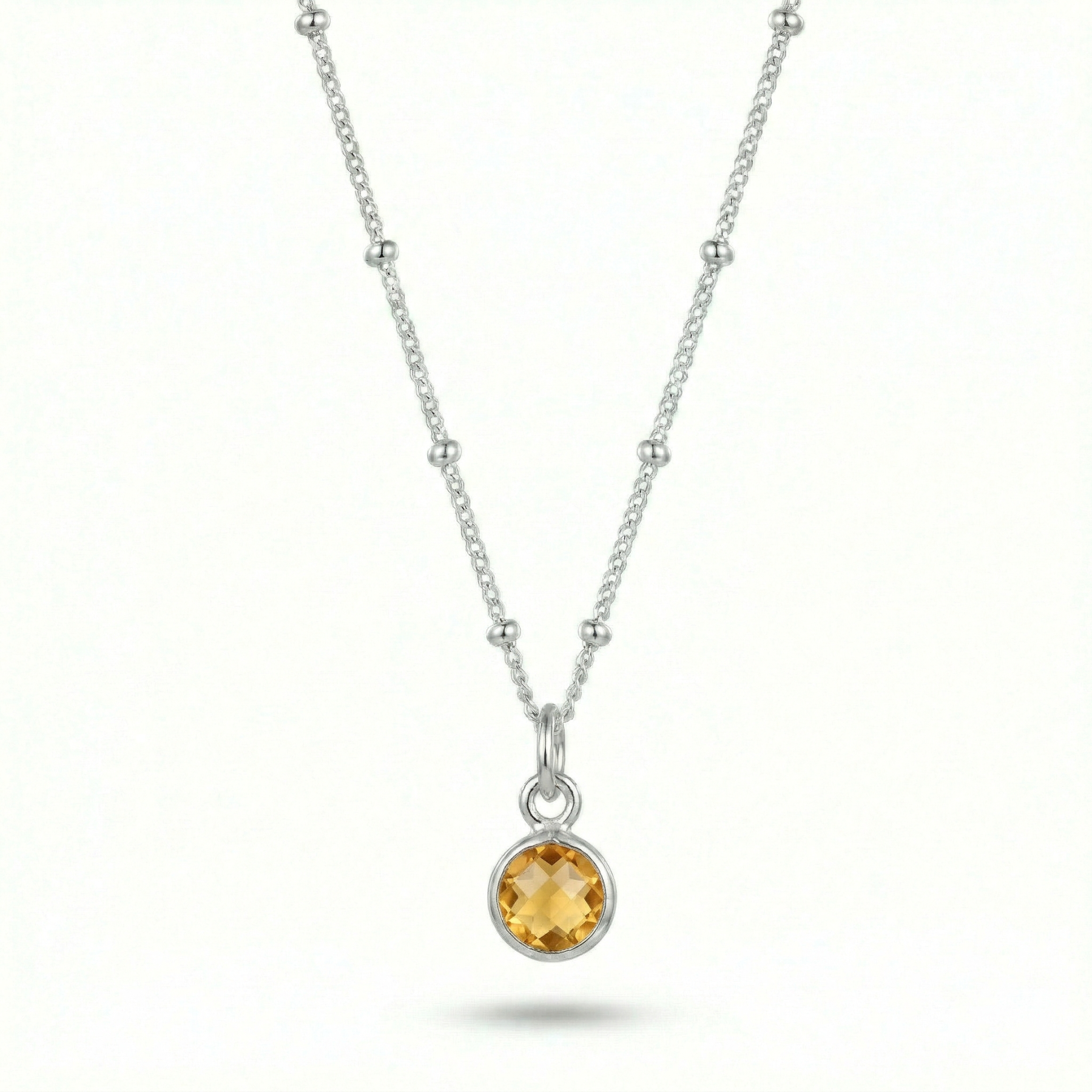 Citrine gemstone charm necklace in sterling silver, everyday jewellery UK