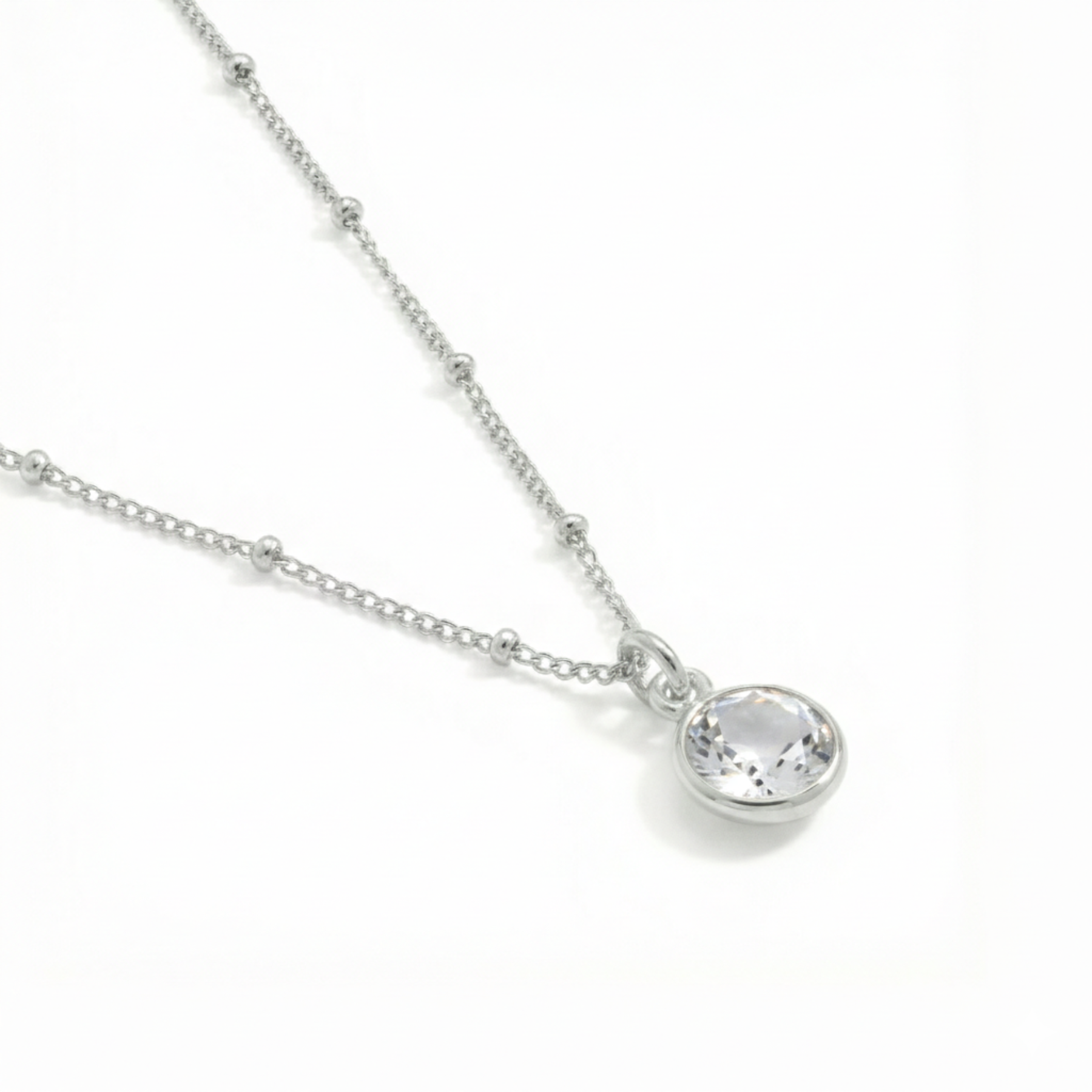 Clear crystal necklace in sterling silver, minimalist pendant jewellery UK