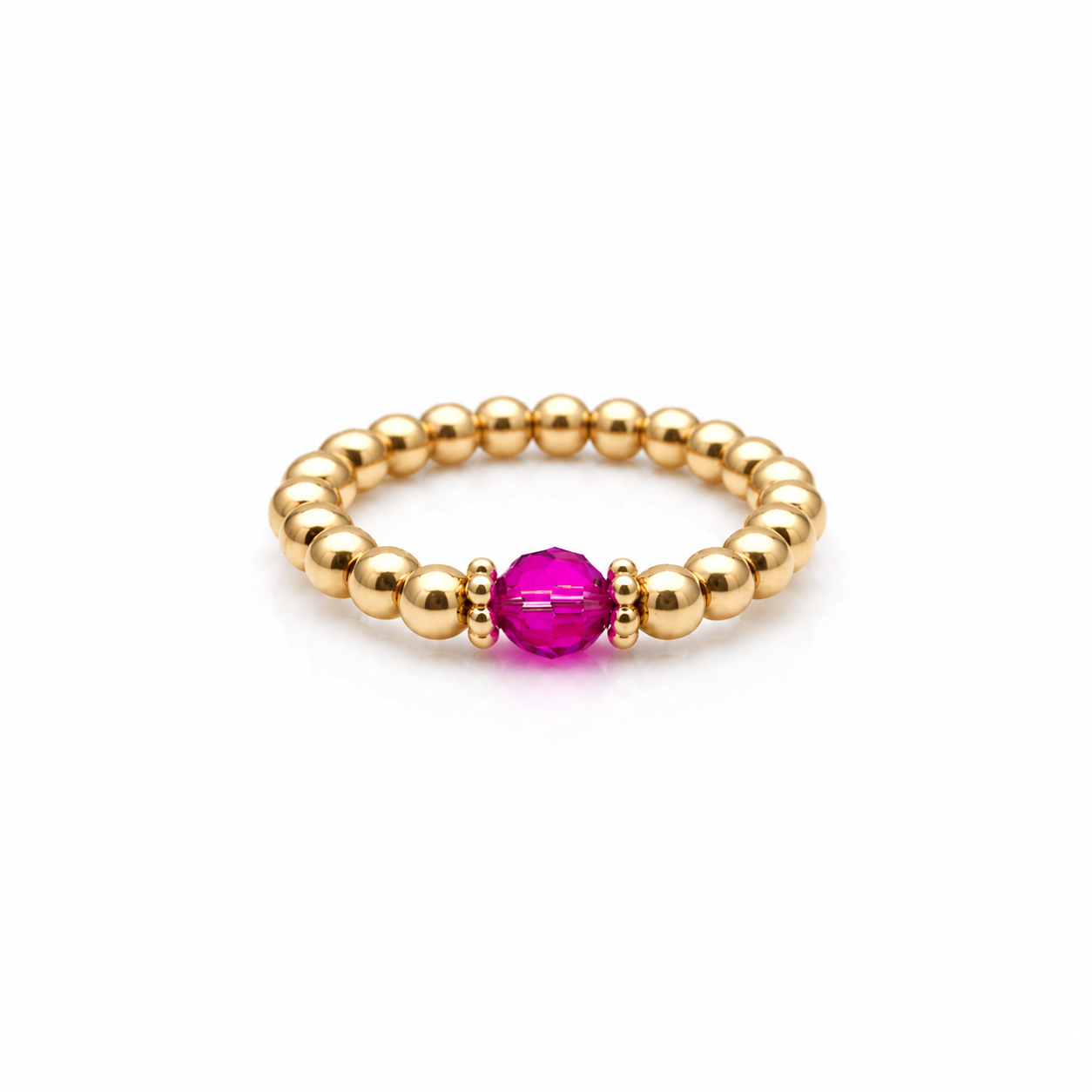 fuchsia crystal ring with a faceted pink gemstone set on a gold filled bead ring