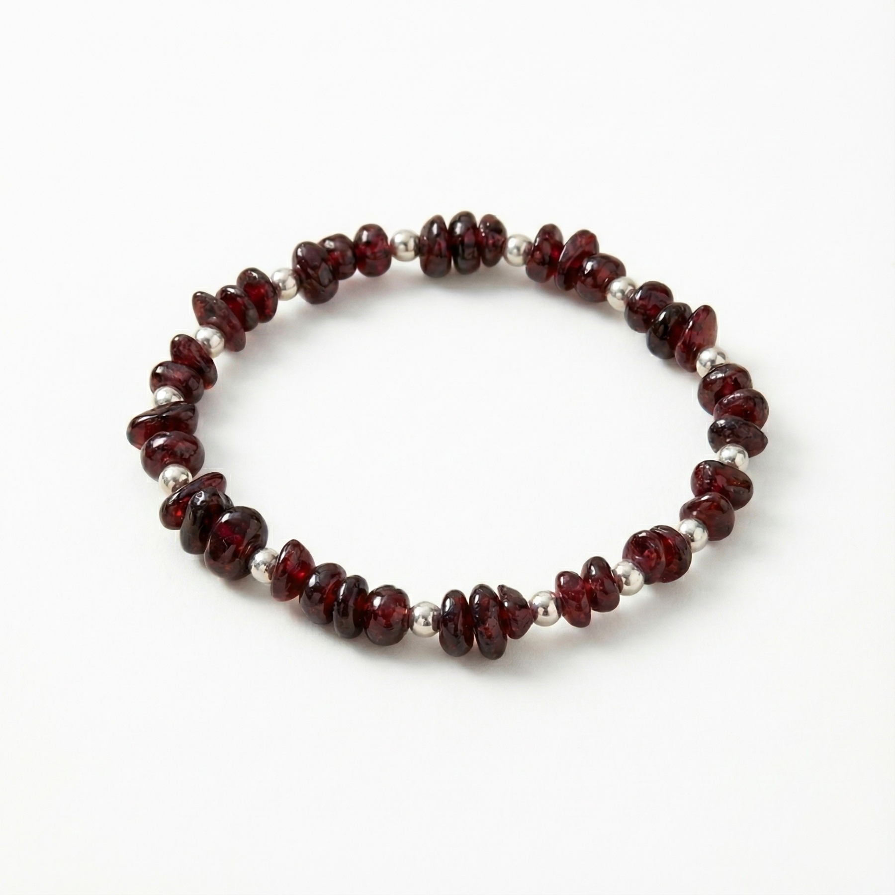 January garnet bead bracelet with rich red gemstone beads and sterling silver accents.