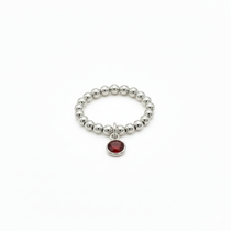 stretchy sterling silver bead ring with red gemstone charm - january garnet birthstone 