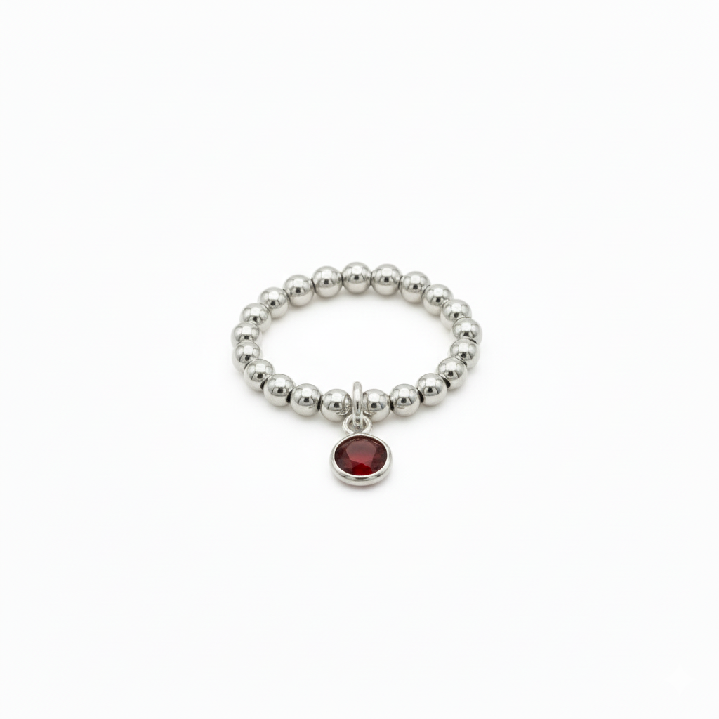 stretchy sterling silver bead ring with red gemstone charm - january garnet birthstone 