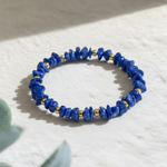 Gold and blue gemstone stretch bead bracelet with lapis lazuli, September birthstone jewellery gift
