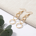 Gold hoop long drop dangle earrings, statement jewellery UK