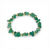 Green agate crystal bead stretch bracelet with gold-tone beads and faceted green gemstones.