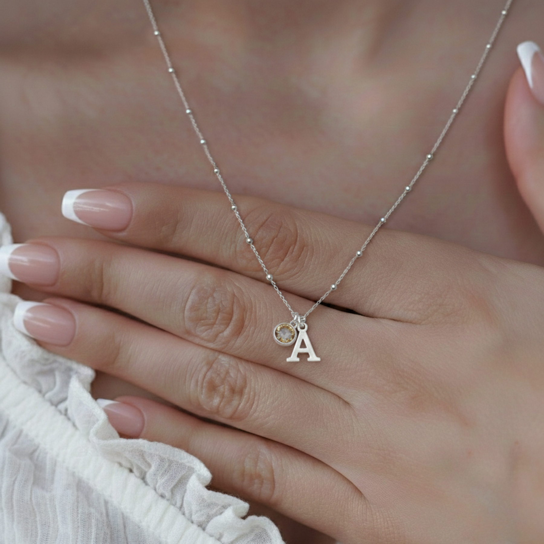 Personalised initial and citrine birthstone necklace in sterling silver, November birthday jewellery gift for her.