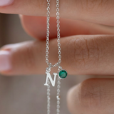 Initial letter and emerald birthstone necklace in sterling silver
