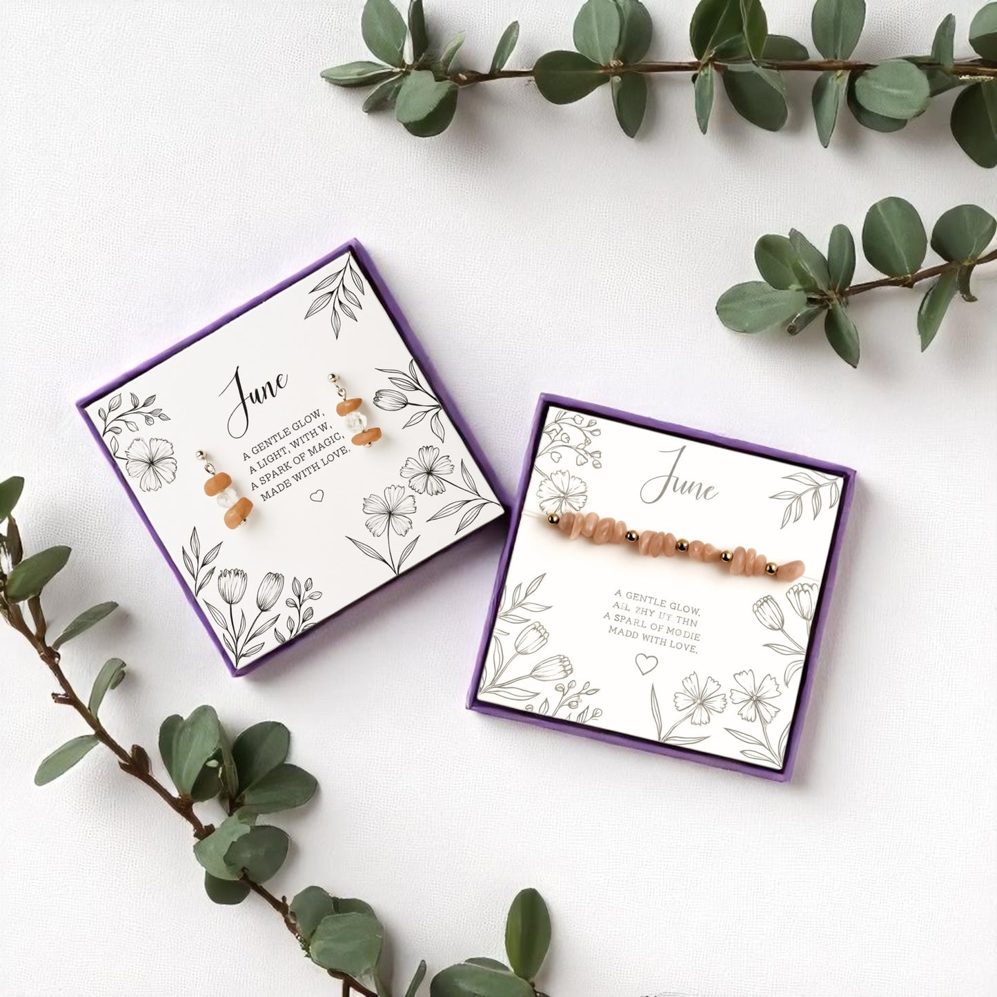 Handmade June birthstone jewellery gift set with peach moonstone earrings and stretch crystal bracelet, both displayed on floral message cards in purple gift boxes. A meaningful gemstone set perfect for gifting, styled with eucalyptus on a white linen background.