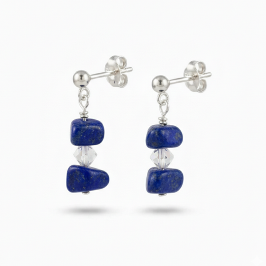 Lapis lazuli gemstone drop earrings in sterling silver with deep celestial blue stones and subtle golden flecks, meaningful September birthstone jewellery.