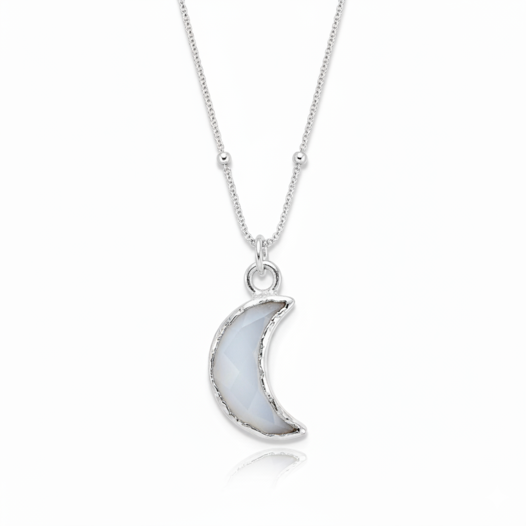 Silver crescent moon necklace with agate stone pendant on a sterling silver chain.