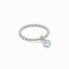 Moonstone charm ring in sterling silver, stretch bead birthstone ring UK