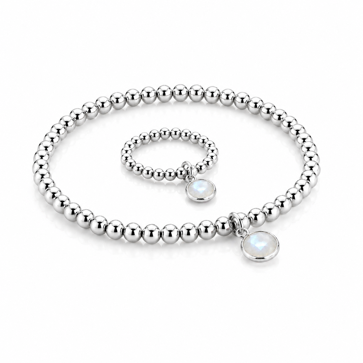 Handmade moonstone birthstone jewellery set featuring matching sterling silver stretch bead bracelet and ring with oval moonstone charm, June birthstone gift by Made Here with Love