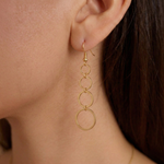 Minimal long drop gold multi hoop earrings, modern statement earrings UK