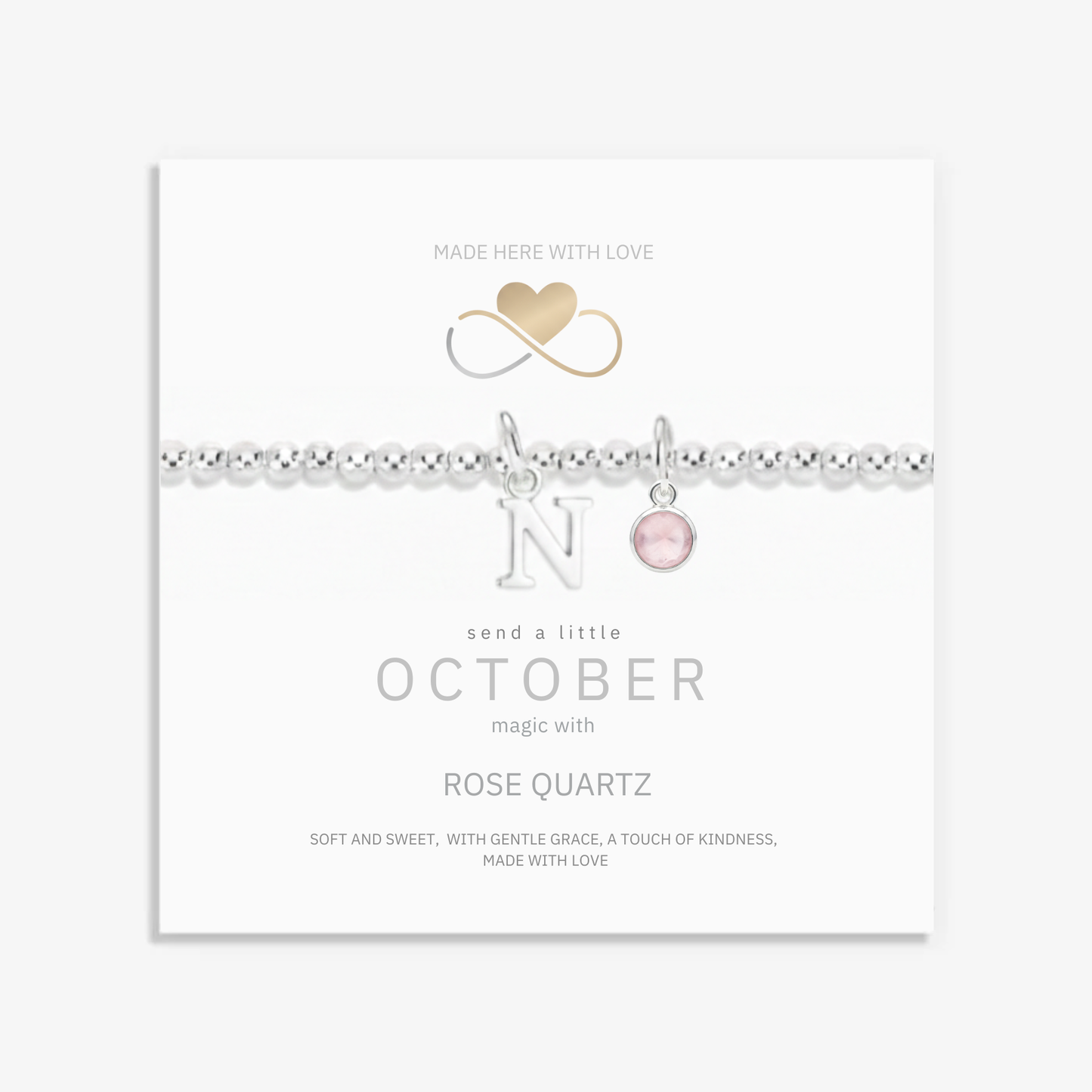 October birthstone necklace with rose quartz gemstone and initial letter charm in sterling silver, personalised jewellery gift.