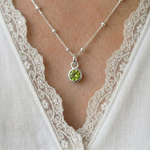 Peridot charm necklace in sterling silver, August birthstone pendant UK