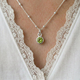Peridot charm necklace in sterling silver, August birthstone pendant UK