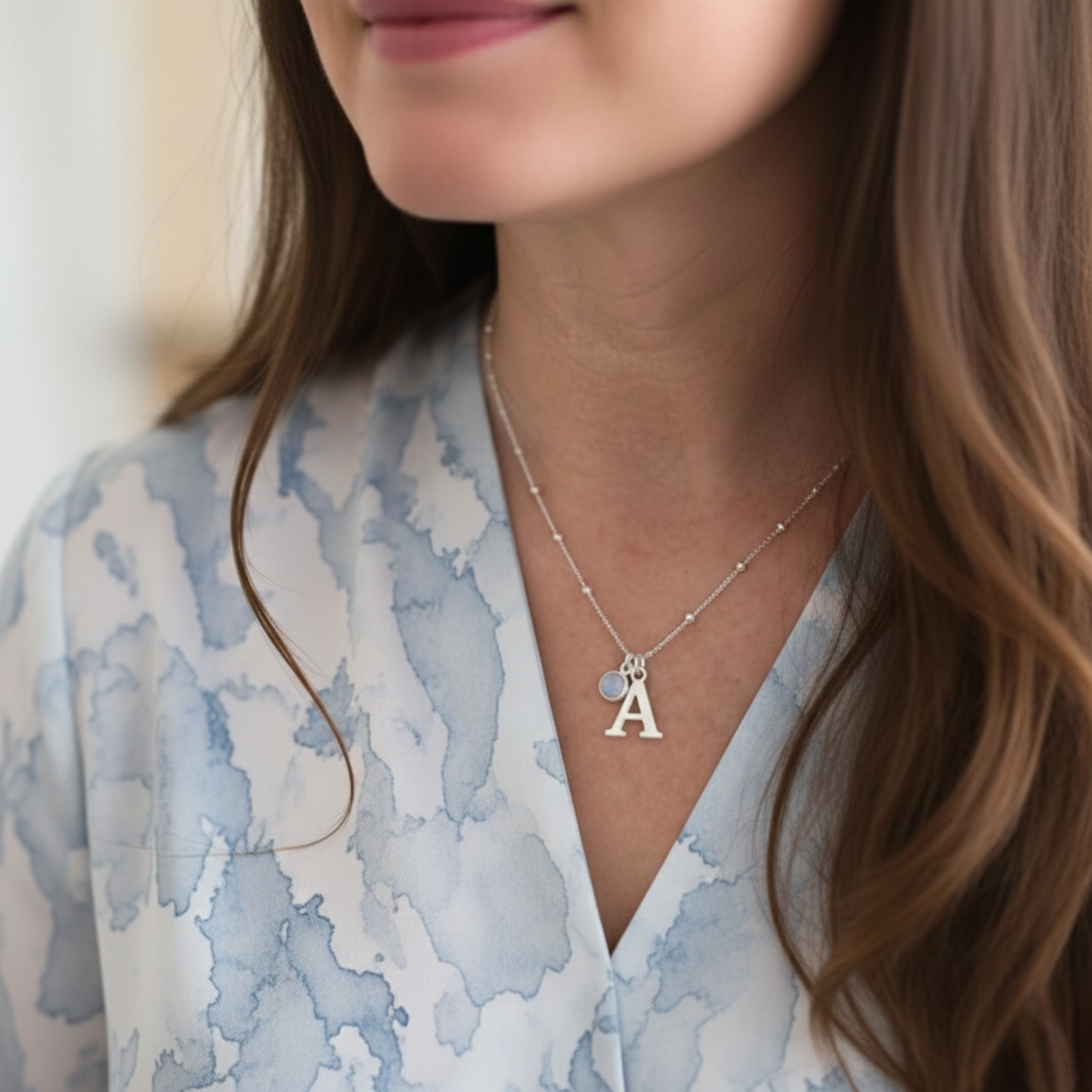 Personalised jewellery gift June moonstone birthstone necklace with letter charm