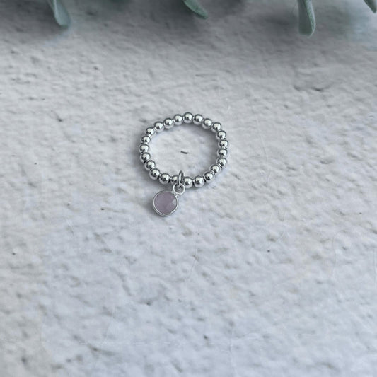 Rose Quartz Birthstone Ring handmade with sterling silver or gold filled beads and a natural rose quartz charm