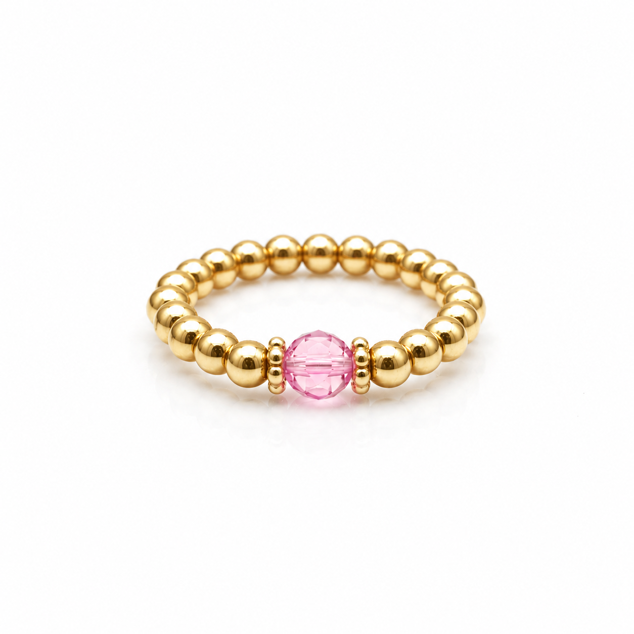rose crystal ring with a faceted pink gemstone set on a gold filled bead ring.