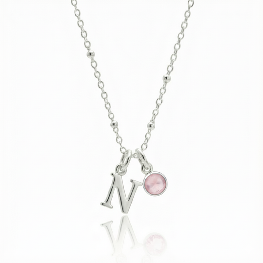 Rose quartz and initial letter charm necklace in sterling silver, personalised October birthstone jewellery for her.