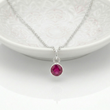 Ruby birthstone charm necklace in sterling silver, July birthstone jewellery UK