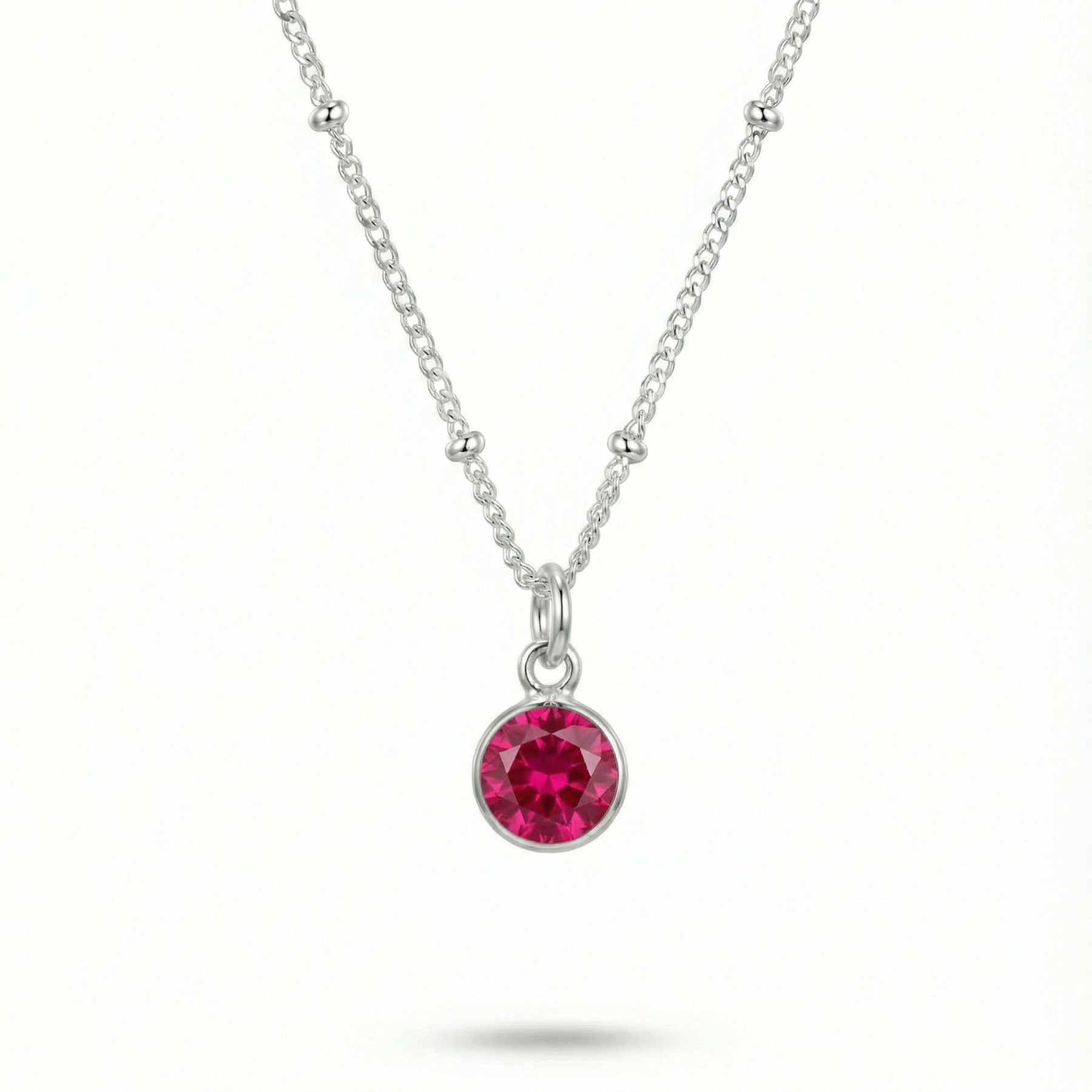 Ruby gemstone necklace in sterling silver, July birthstone pendant UK